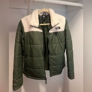 Dark green north face puffy jacket. Soft shoulders. Worn maybe twice. Like new!